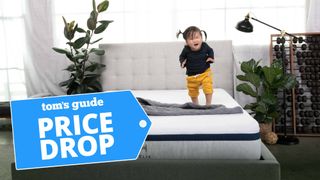 Helix Midnight mattress with a toddler standing on top of it