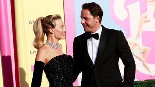 Australian actress Margot Robbie and her husband British producer Tom Ackerley arrive for the world premiere of "Barbie" at the Shrine Auditorium in Los Angeles, on July 9, 2023.