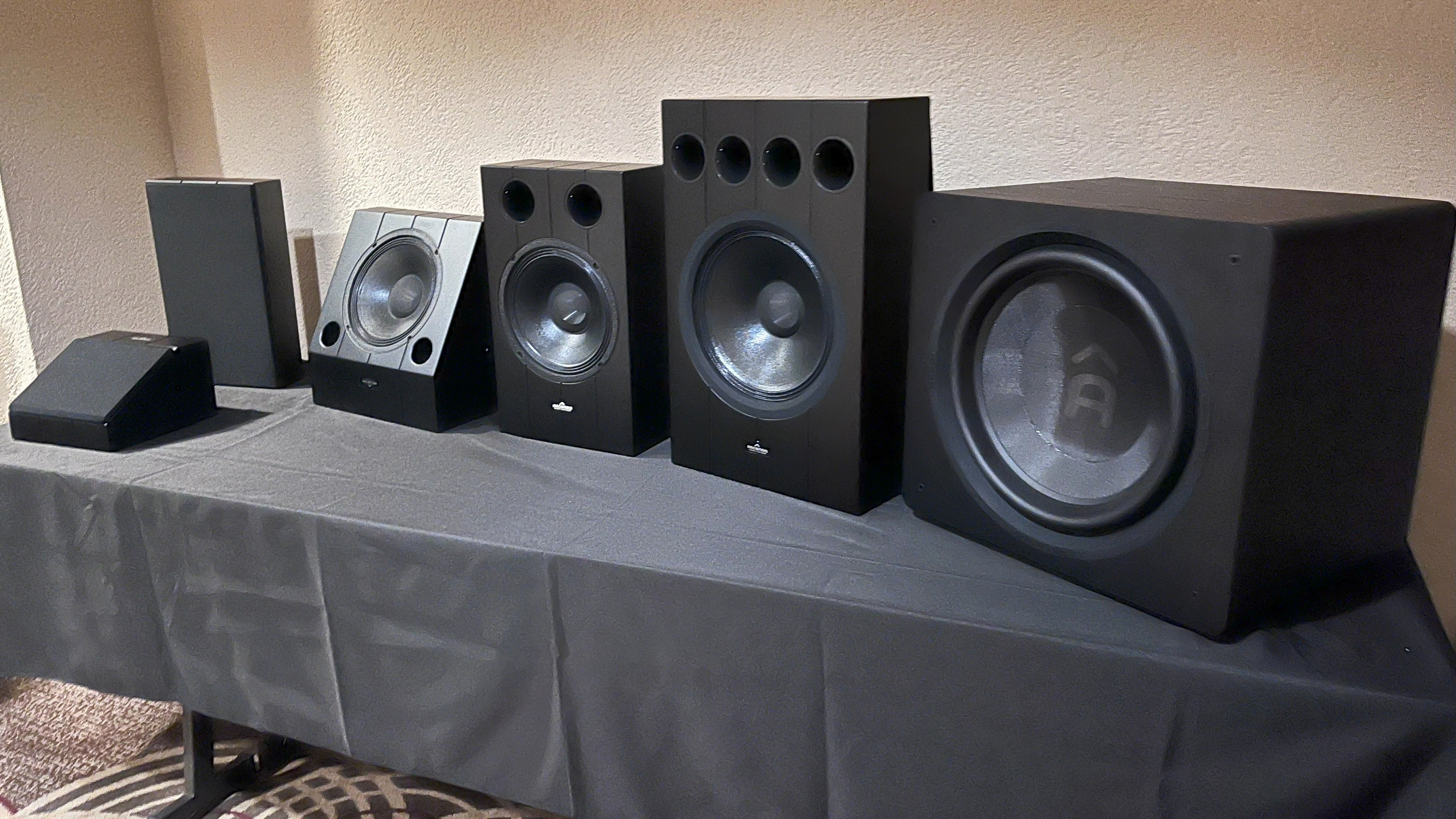 Various speakers in the Ascendo range on a display table