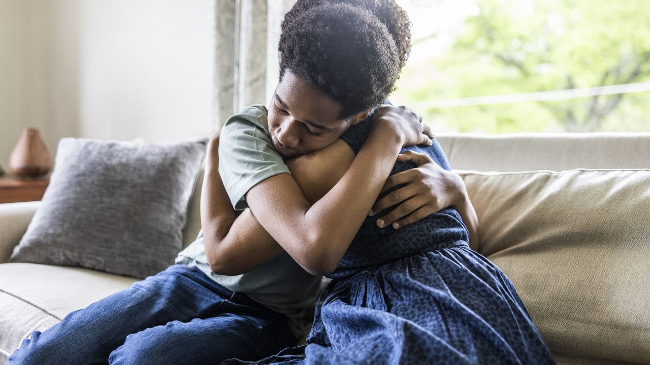 Heartbroken teen with mum