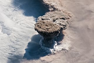An astronaut's photo of the Raikoke volcano erupting on June 22, 2019.