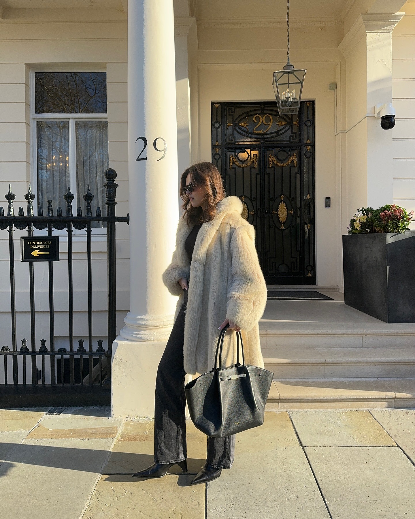 @maggie_mccormack wearing black jeans.