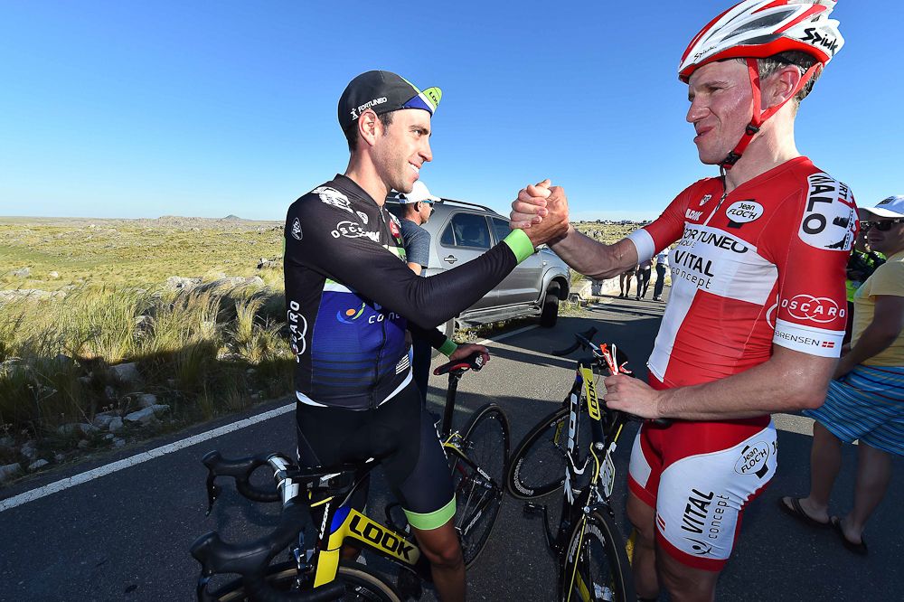 Chris Anker Sorenson congratulates stage winner Eduardo Sepulveda