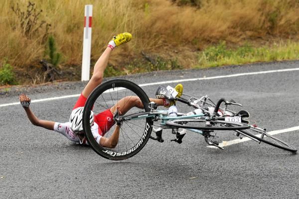 Mayuko Hagiwara (Japan National Team) crashes heavily on a slippery descent, as did defending champion Amber Halliday (bike but not rider pictured).