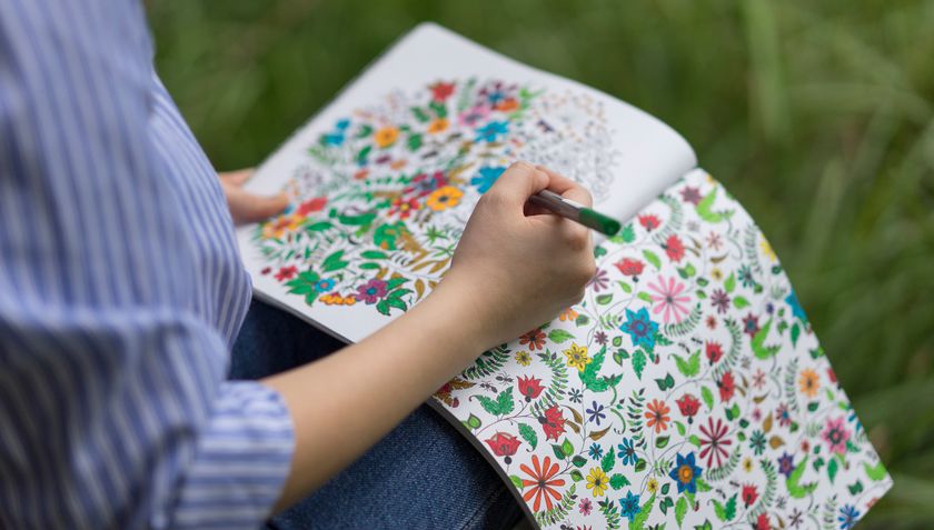 Woman with one of the best colouring books