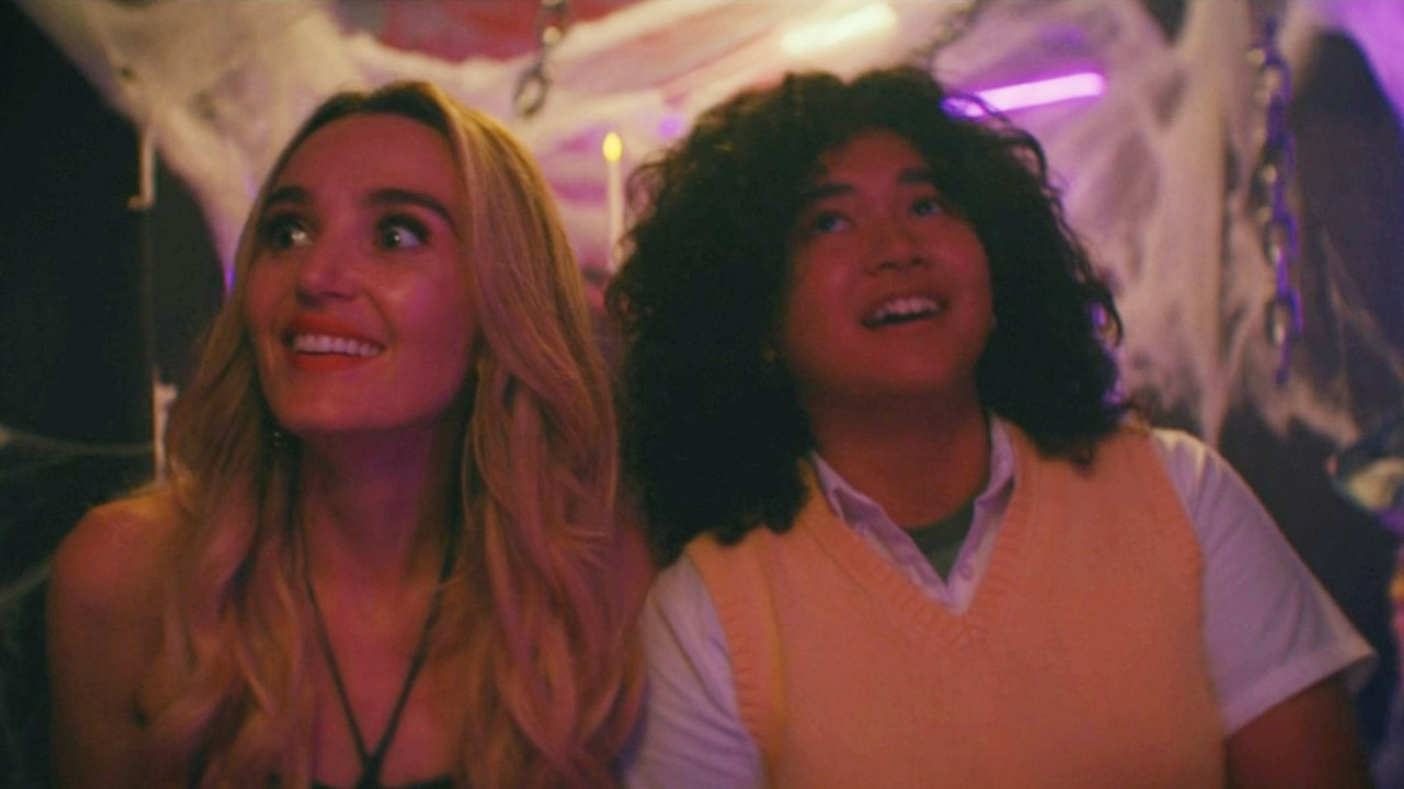 Chloe Fineman and Sam Morelos looking in wonder in Summer of 69.