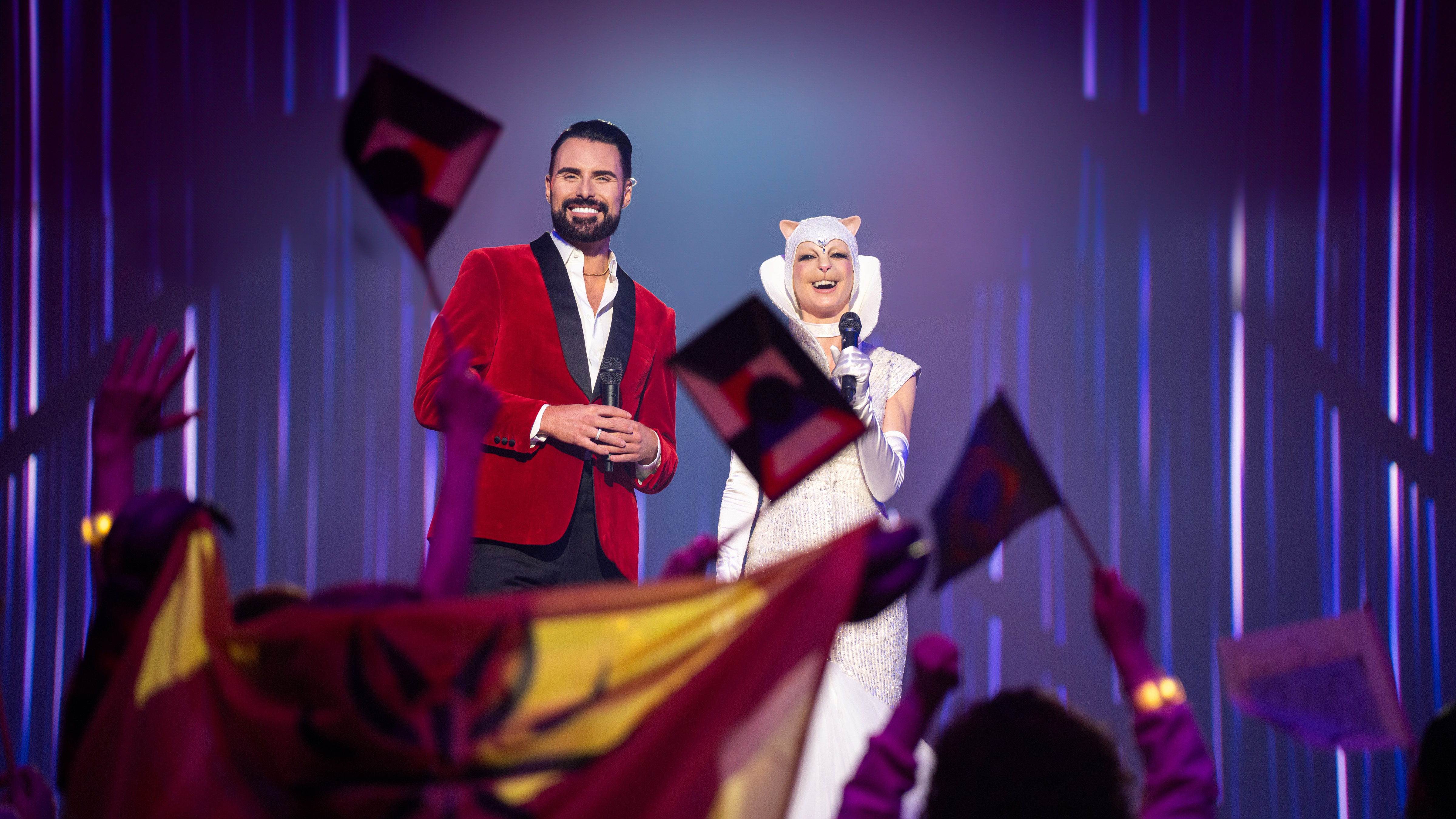 Rylan Clark as himself and Julie Dray as Sabine in Doctor Who's 'The Interstellar Song Contest.'