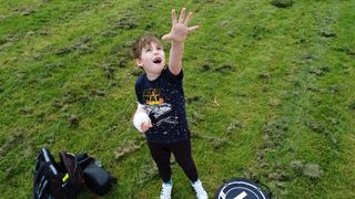 Boy looking at drone