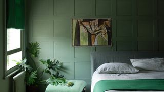 matt sage green emulsion paint in bedroom