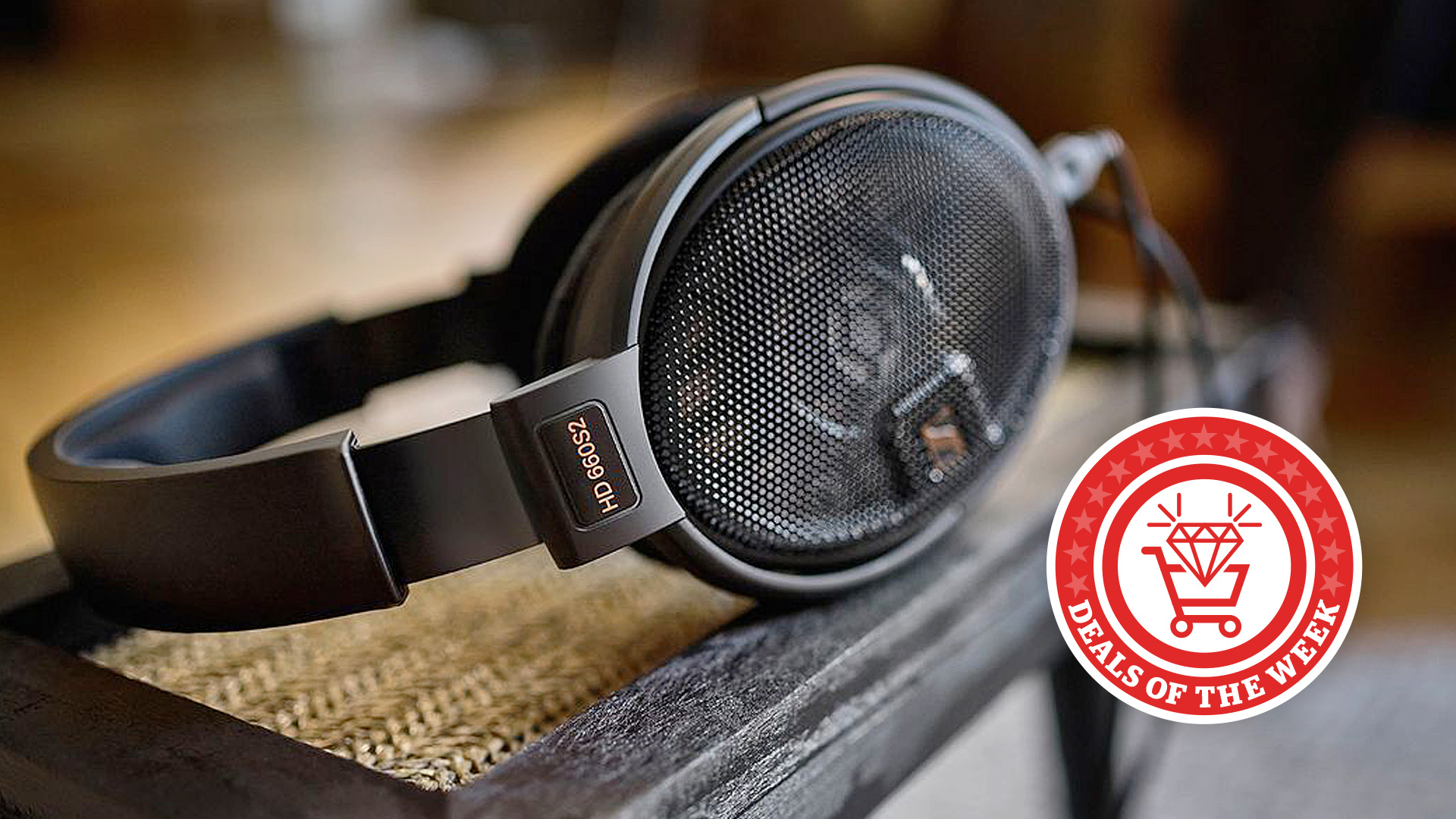 Sennheiser HD 660S2 wired headphones on a wooden surface