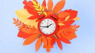 Alarm clock with fall autumn leaves