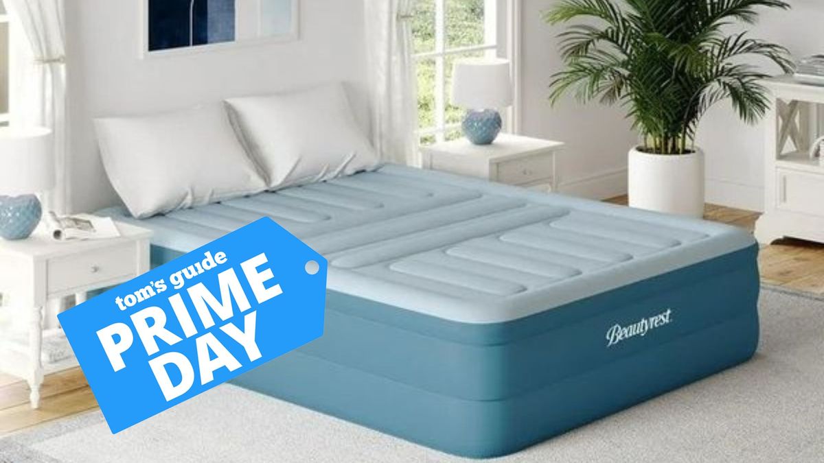 A blue Beautyrest guest mattress in a light bedroom 