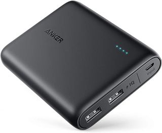 A black Anker portable charger