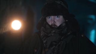 Repo Monster Update trailer still - guy holding a flashlight