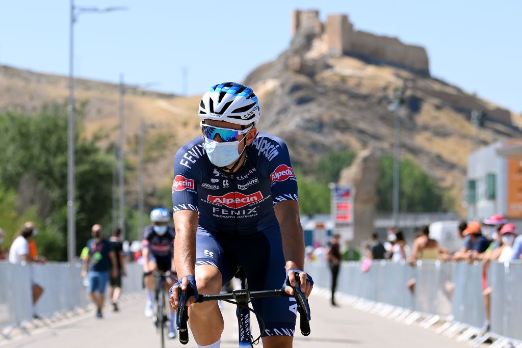 MOLINA DE ARAGON SPAIN AUGUST 17 Edward Planckaert of Belgium and Team AlpecinFenix prepares for the race prior to the 76th Tour of Spain 2021 Stage 4 a 1639km stage from El Burgo de Osma to Molina de Aragn 1134m lavuelta LaVuelta21 on August 17 2021 in Molina de Aragn Spain Photo by Stuart FranklinGetty Images