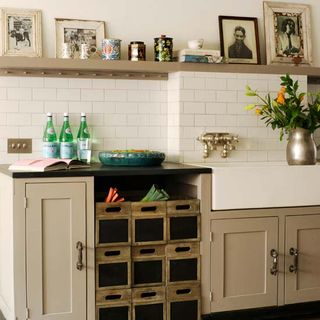 kitchen with white wall and blackboard paint vegetable drawers