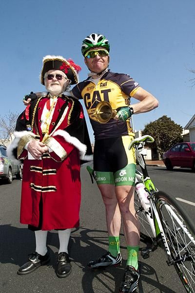 Hear ye, hear ye, hear ye: Tour leader Gordon McCauley (Hyster-Total Rush) with the Town Crier in Ulverstone prior to stage nine.