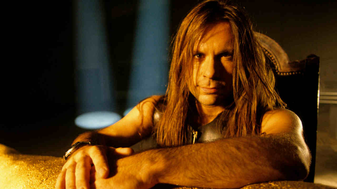 Bruce Dickinson posing for a photograph in 1994