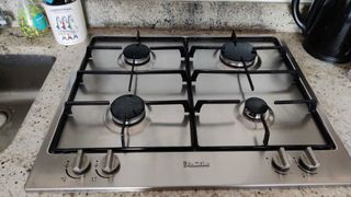 Image shows a gas stove top.