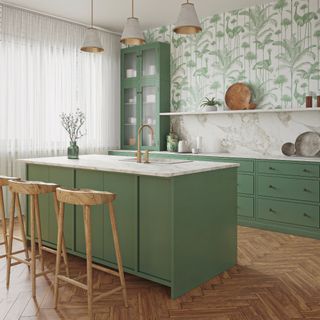 green and white kitchen with reclaimed wood flooring, green kitchen island and green cabinetry, wallpaper, voile curtains