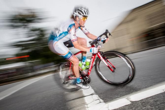Alison Powers (NOW and Novartis) takes a corner on the way to her win.