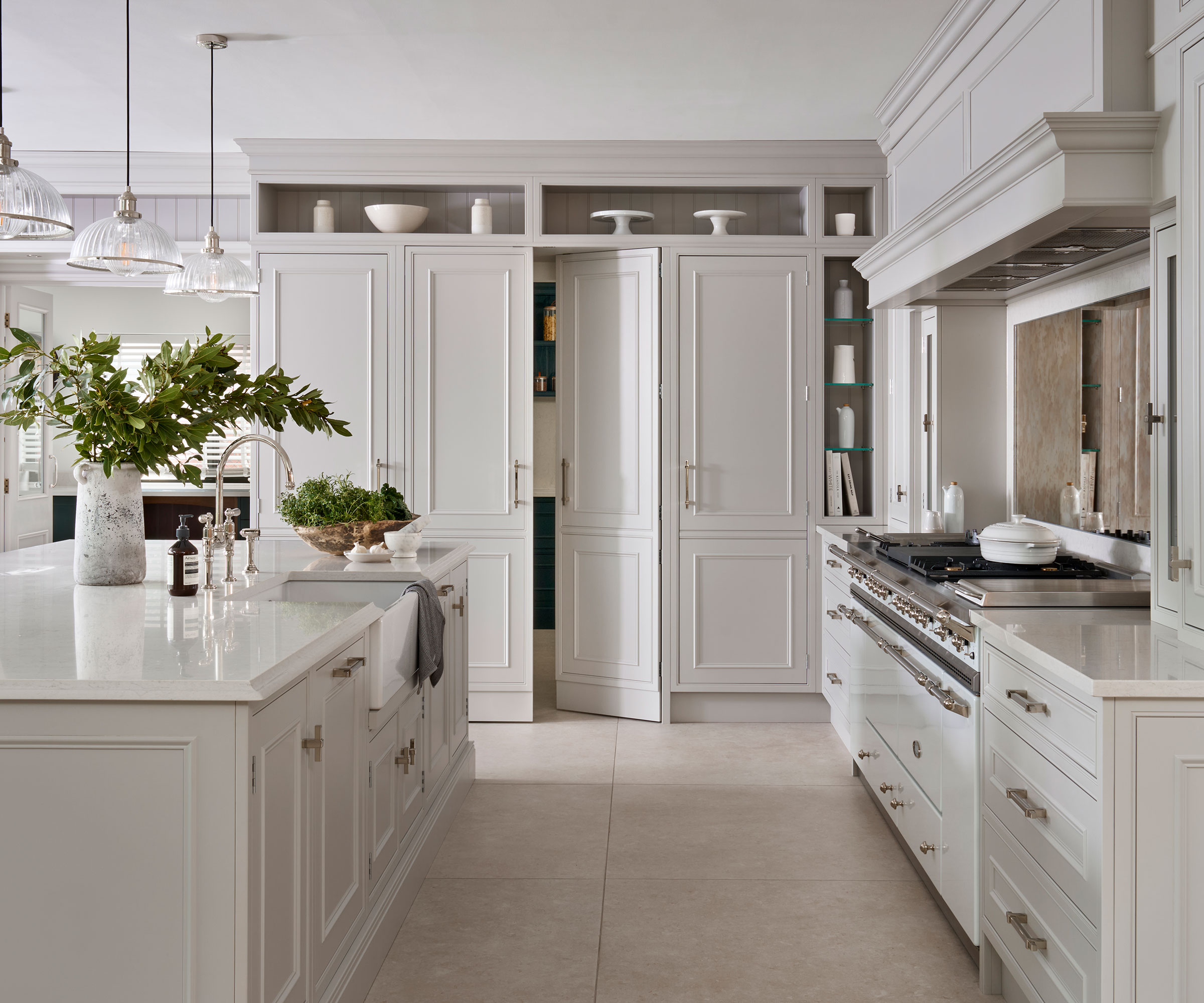 classic white kitchen with brass kitchen hardware