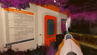 The player powerwashes the inside of a subway carriage from a first person perspective, removing grime from an orange door and a subway timetable.