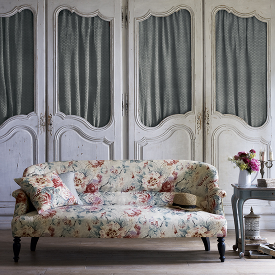 living room with vintage florals sofa