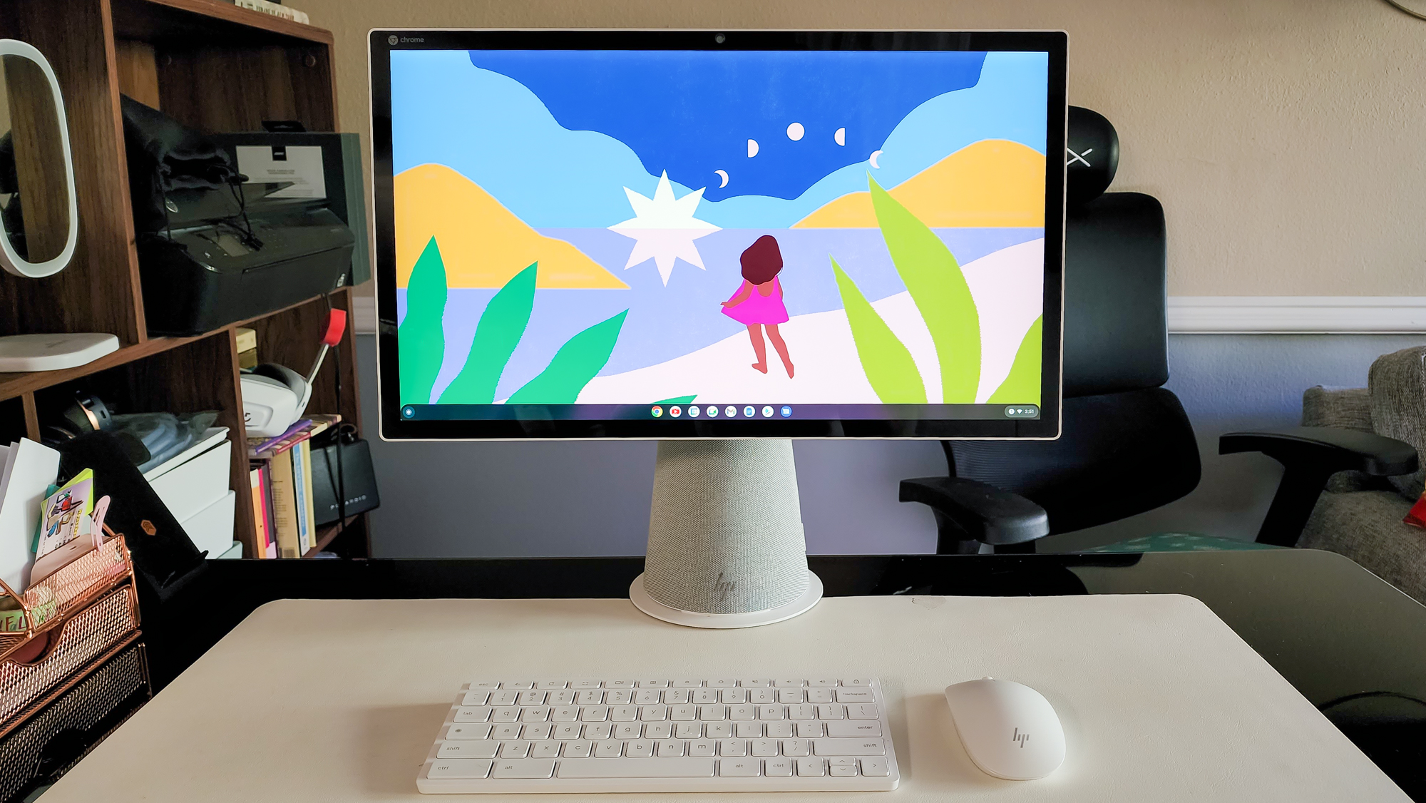 HP Chromebase All-in-One 22 on a table standing next to your keyboard and mouse