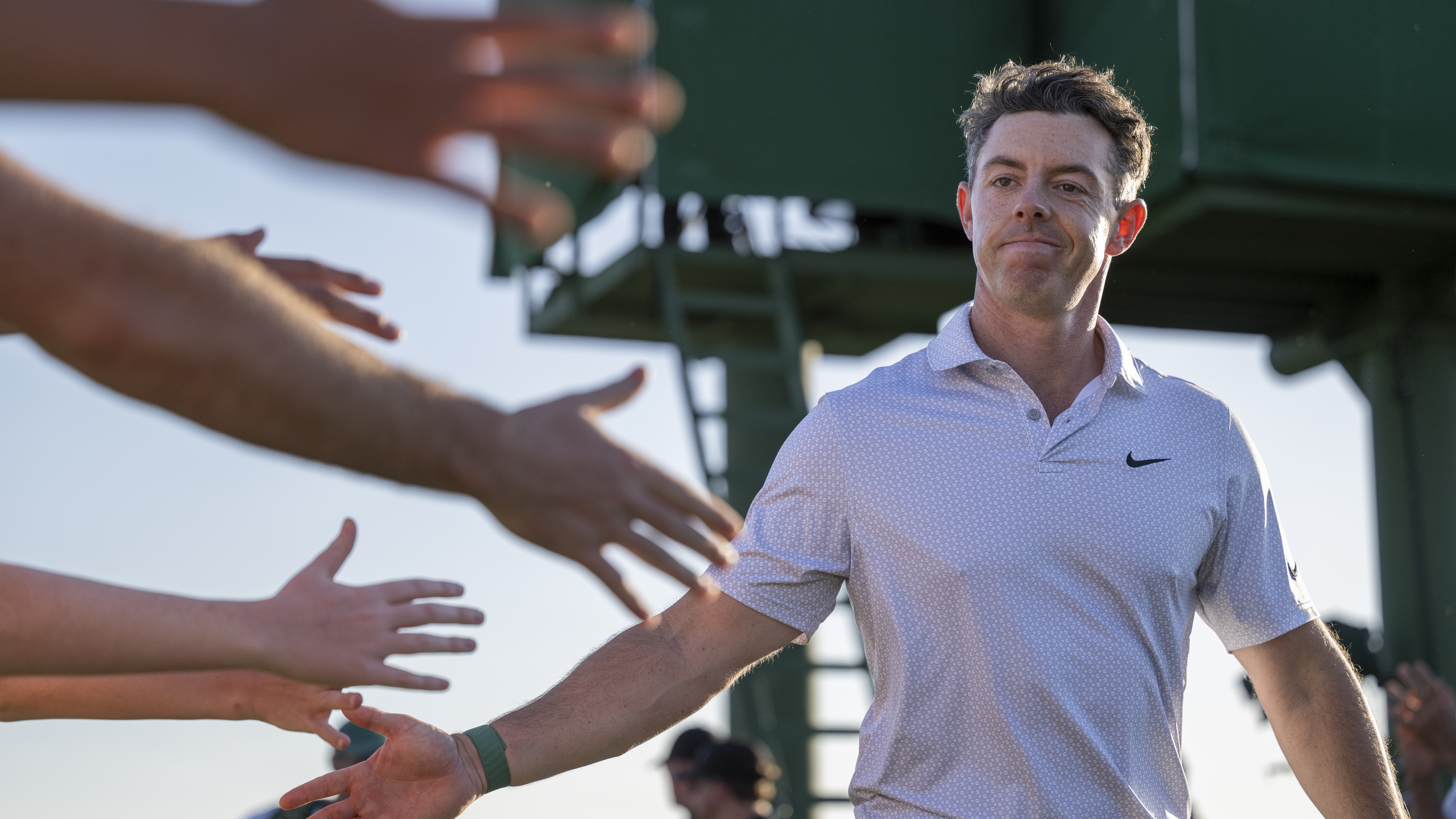 Masters champion Rory McIlroy of Northern Ireland accepts congratulations from Masters patrons after finishing the second round of the Masters at Augusta National Golf Club, Friday, April 10, 2026. 
