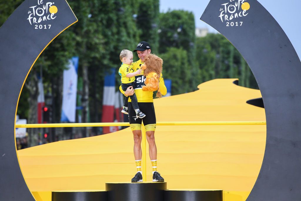 Chris Froome and his son on the Tour de France podium