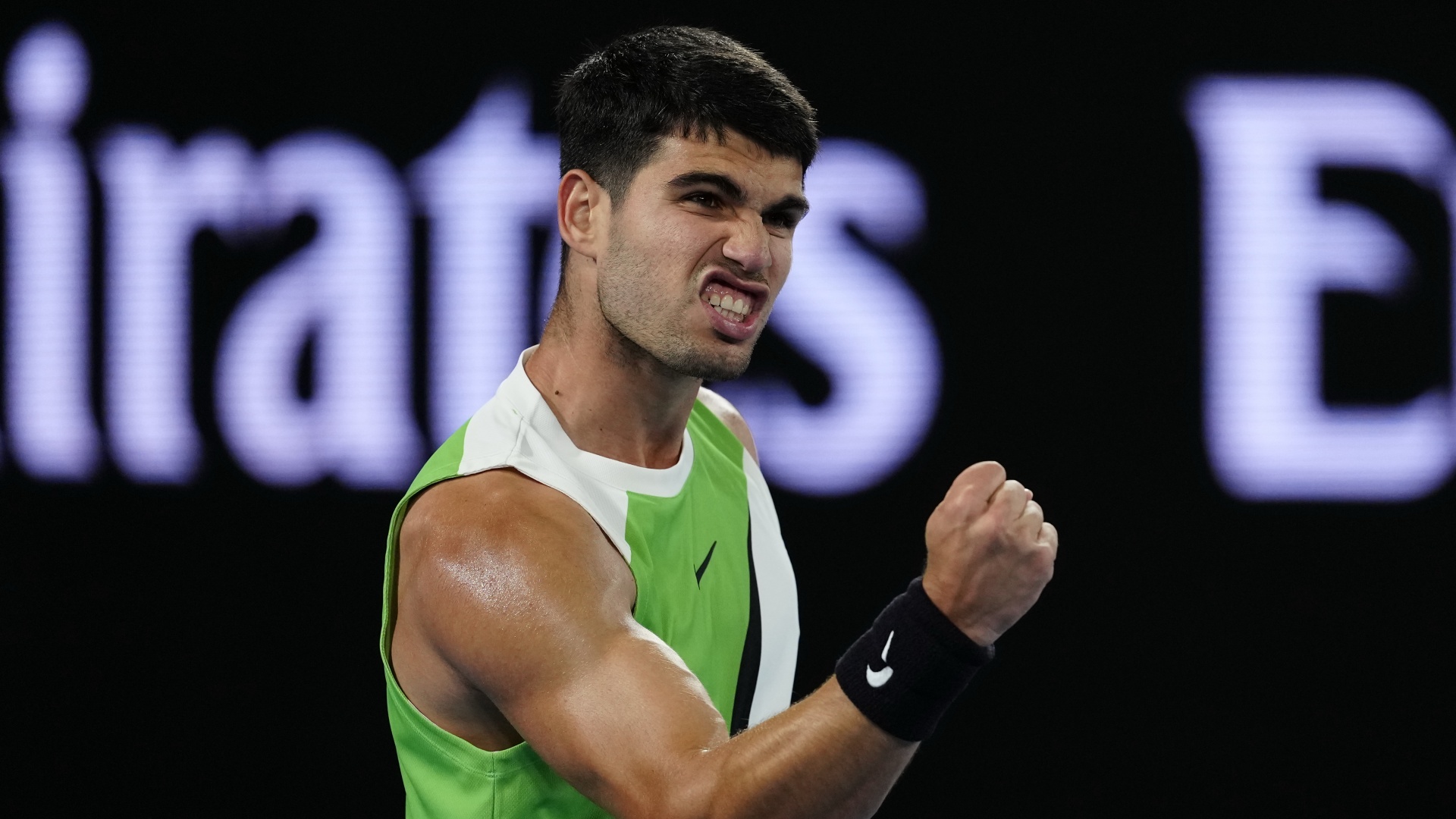 Carlos Alcaraz pumping his fist at Australian Open 2026