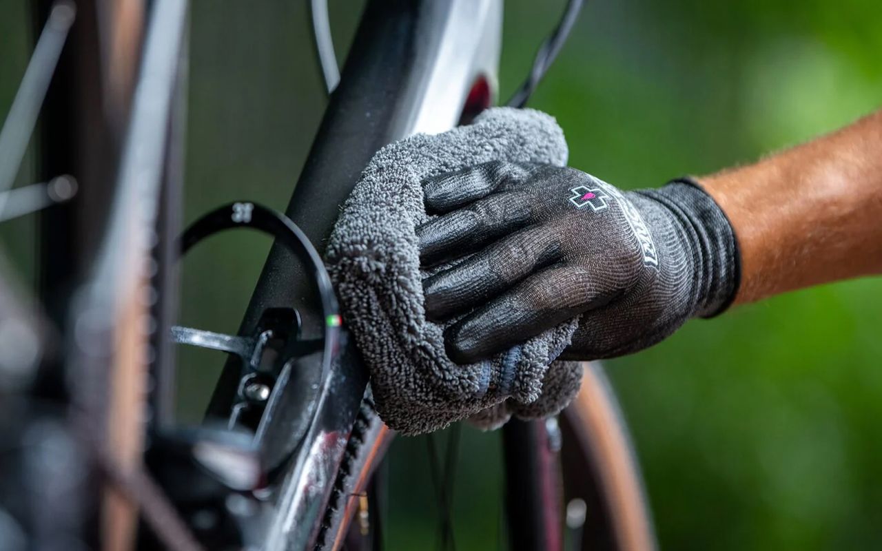 Muc-Off products being used on a bike