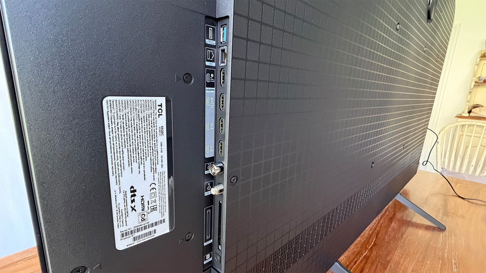 TCL Q6C 65-inch LCD TV, rear of set showing connections
