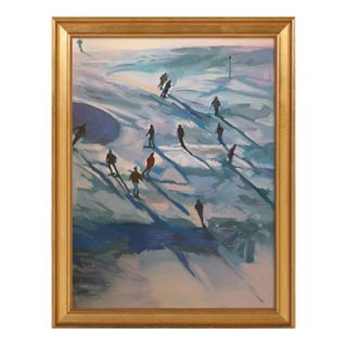 A painting of people skiing in a gold frame