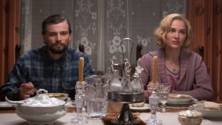 Darren Mann as Jack and Michelle Randolph as Elizabeth sitting at the dinner table in 1923.