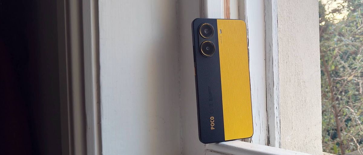 The Xiaomi Poco X7 Pro on a window sill.