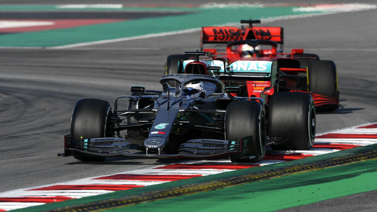 Mercedes driver Valtteri Bottas and Ferrari’s Sebastian Vettel drive during pre-season testing