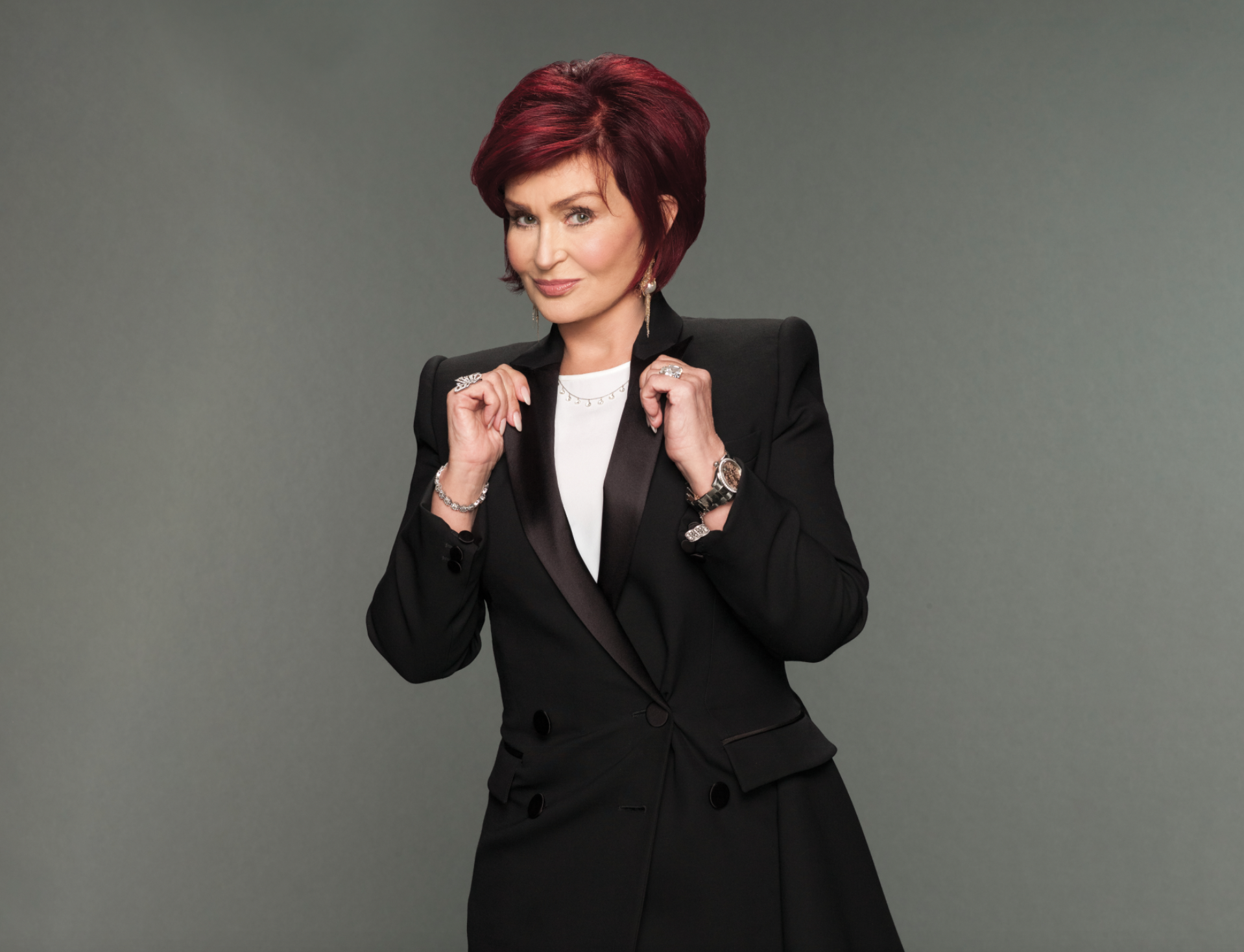 Sharon Osbourne on a grey background
