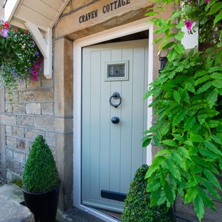 Sage green cottage front door from Endurance Doors