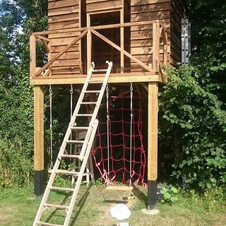 treehouse with trap door and climbing net