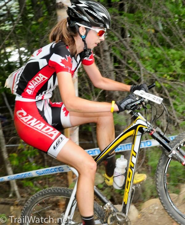 Cassandre Olivier-Lapierre (Canada) muscles her way over some rocks.