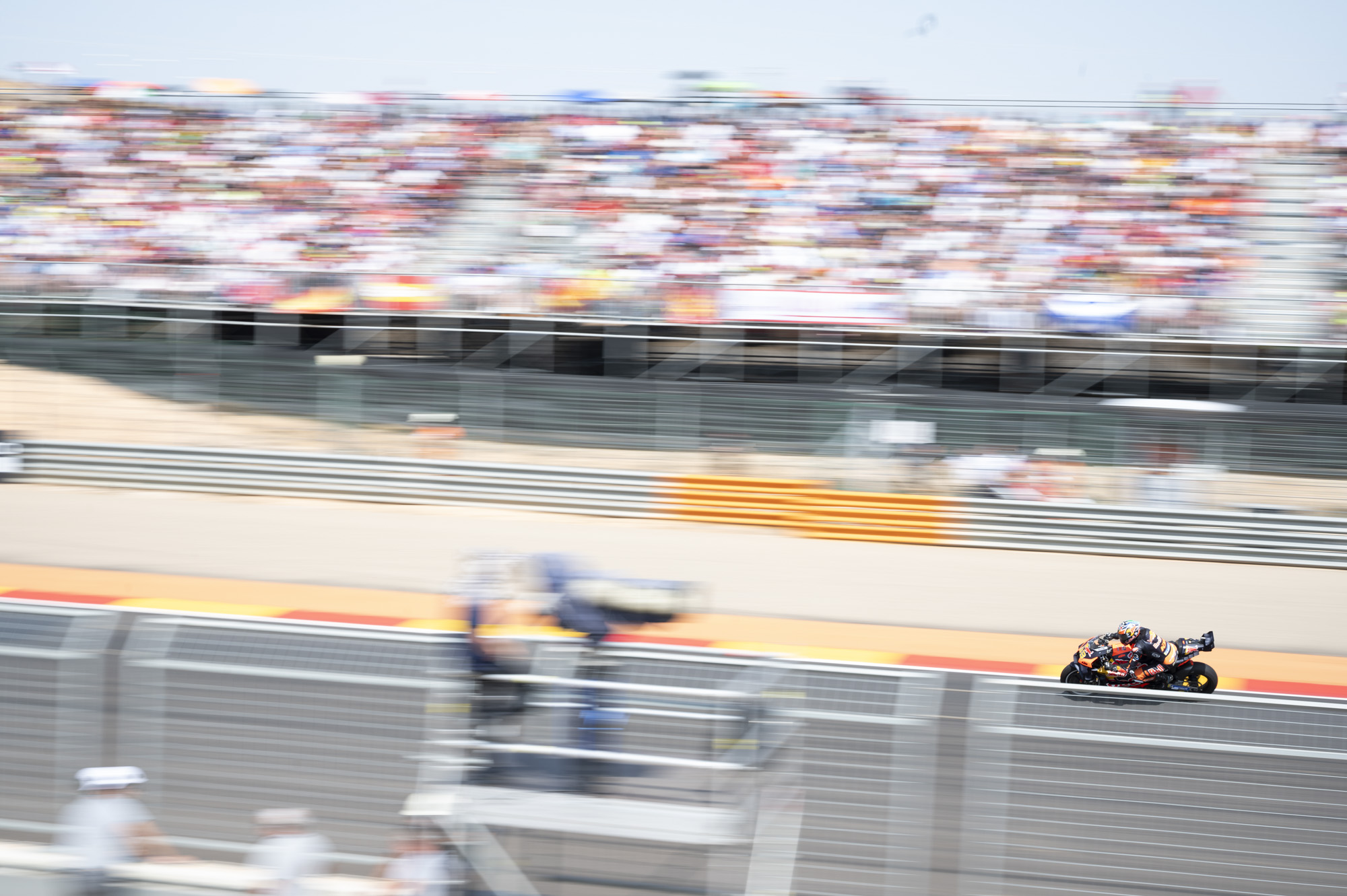 MotoGP racetrack with motorbike riders at full speed