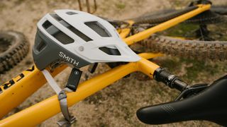 The Aleck music and comms device attached to a Smith MTB helmet