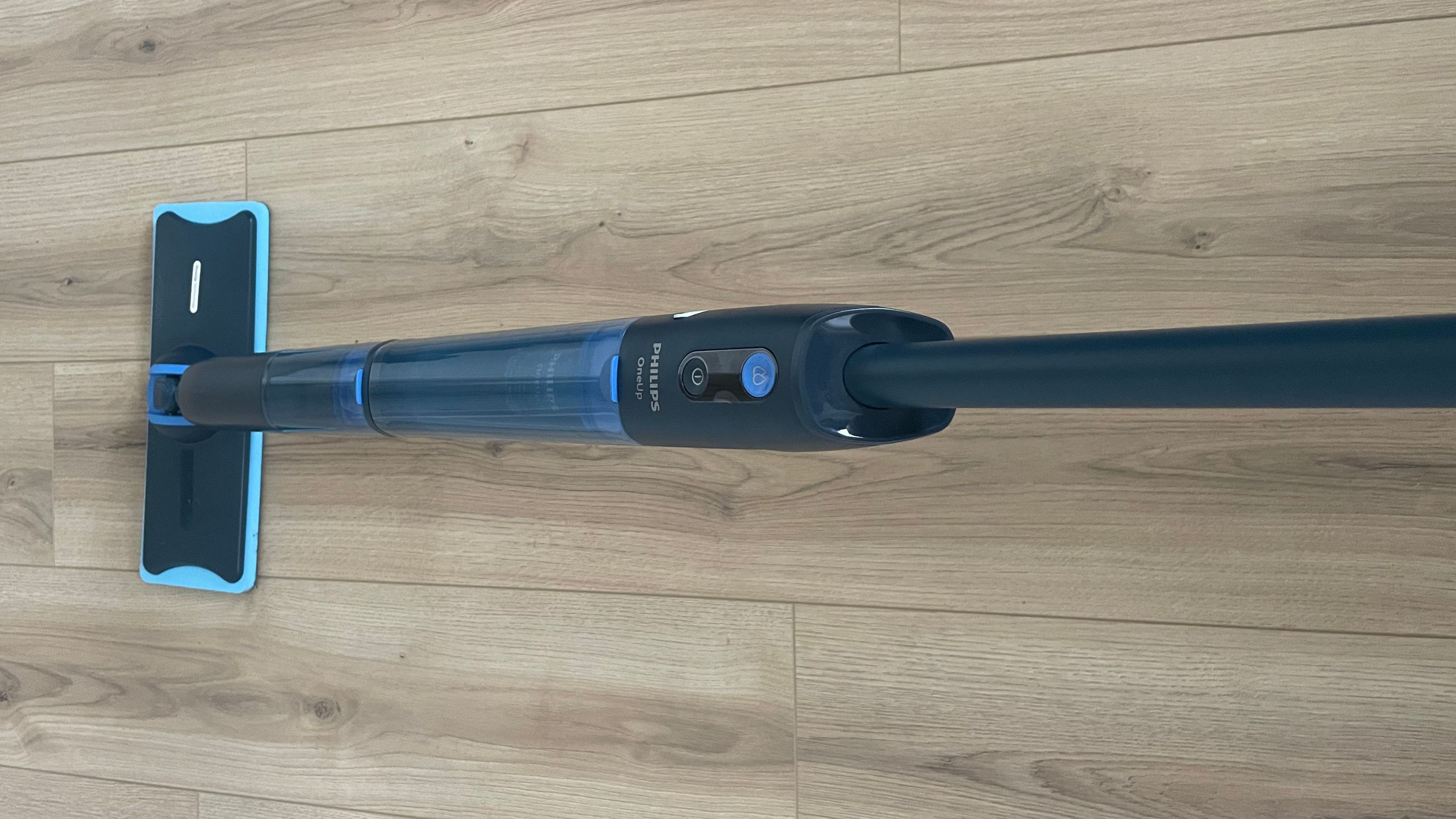 Using the Philips OneUp 5000 Series Electric Mop to clean wood-effect flooring