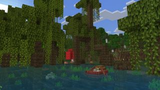 A screenshot of Minecraft depicting a mangrove swamp and frogs