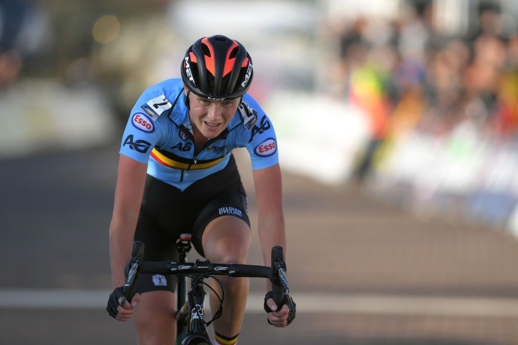 Loes Sels crosses the line