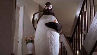 Penguin standing on Veronica's stairs in Billy Madison