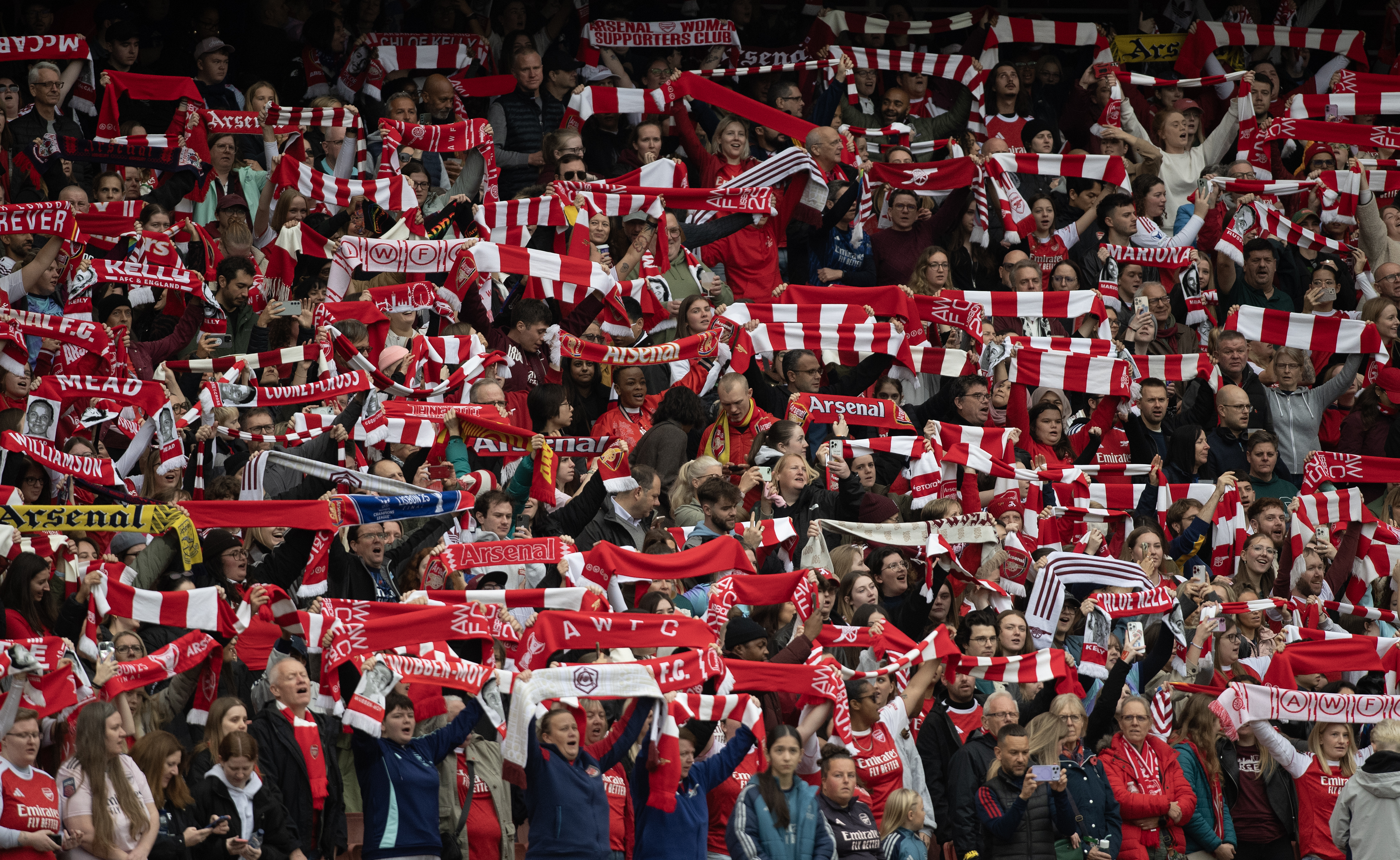 LONDON, ENGLAND - NOVEMBER 08: Arsenal fans hold up scarves before the Barclays Women&#039;s Super League match between Arsenal and Chelsea FC at Emirates Stadium on November 08, 2025 in London, England. 