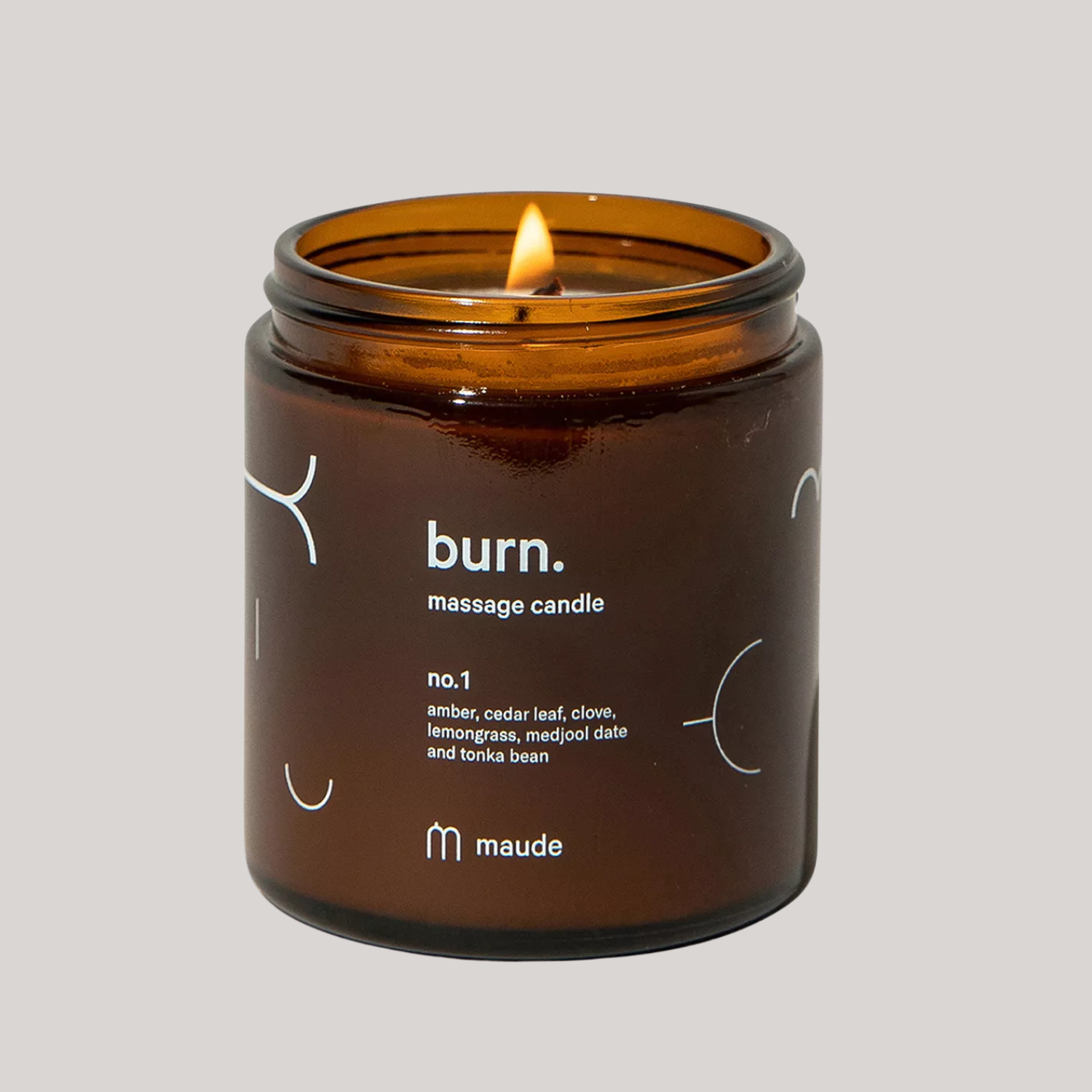 A candle in amber glass